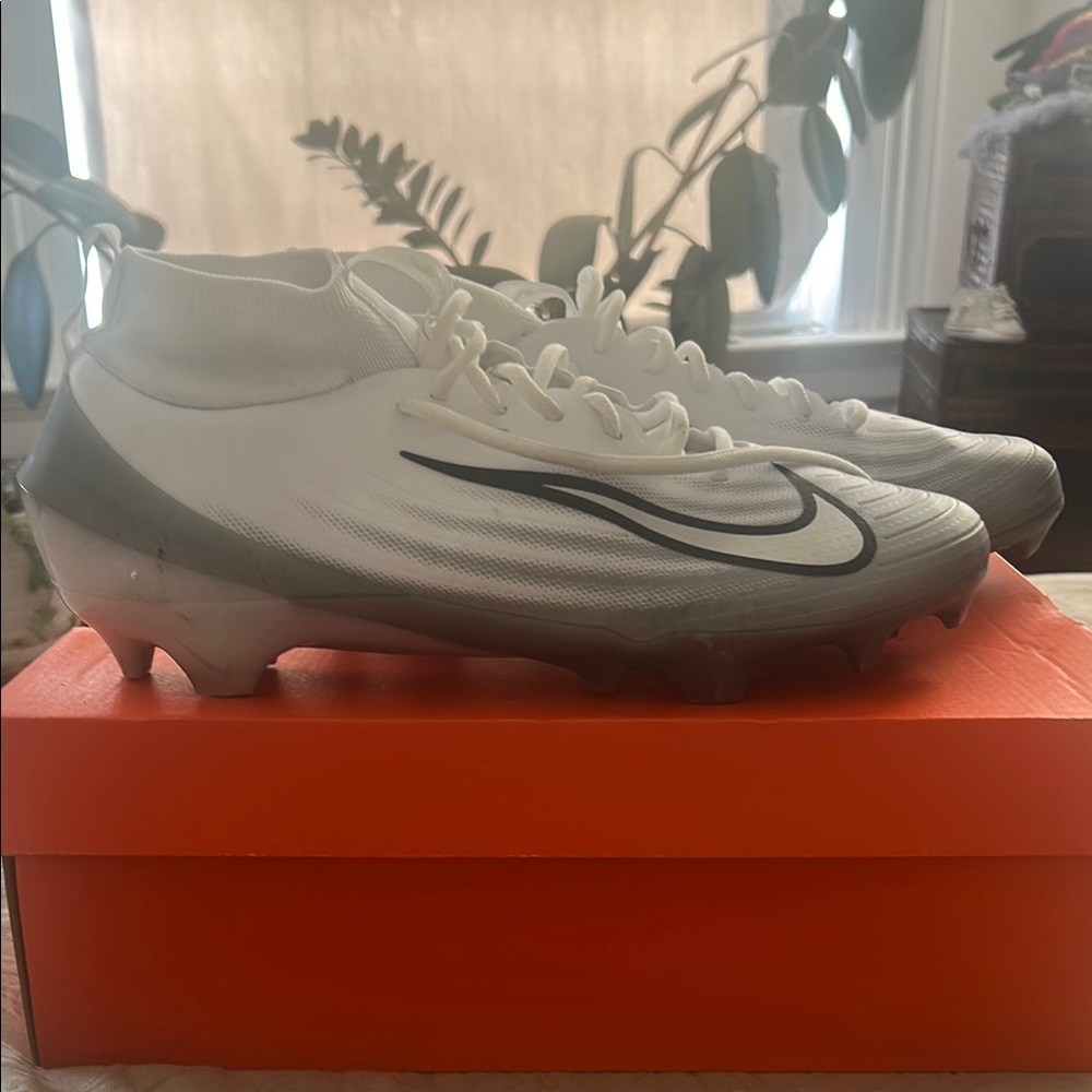 White and Metallic Silver Football Cleats
